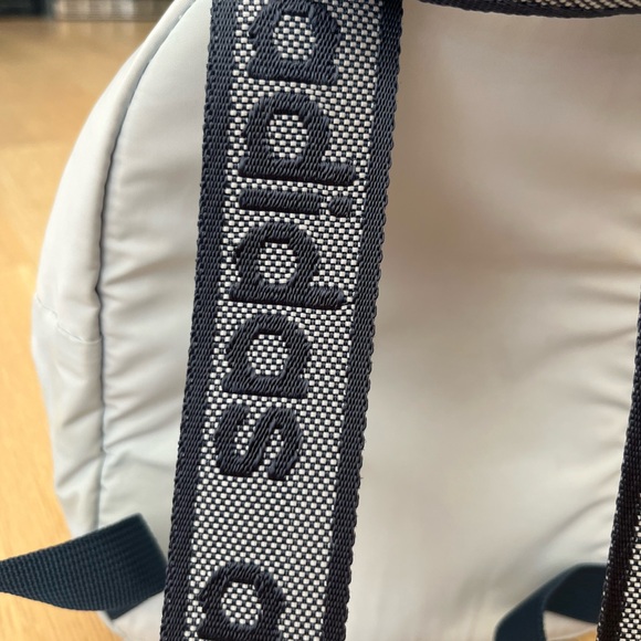 Light blue and navy champion backpack with little stain on the bottom - Picture 5 of 8